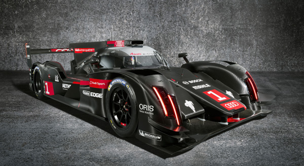 Audi achieves pioneering feat with e-tron quattro four-wheel drive